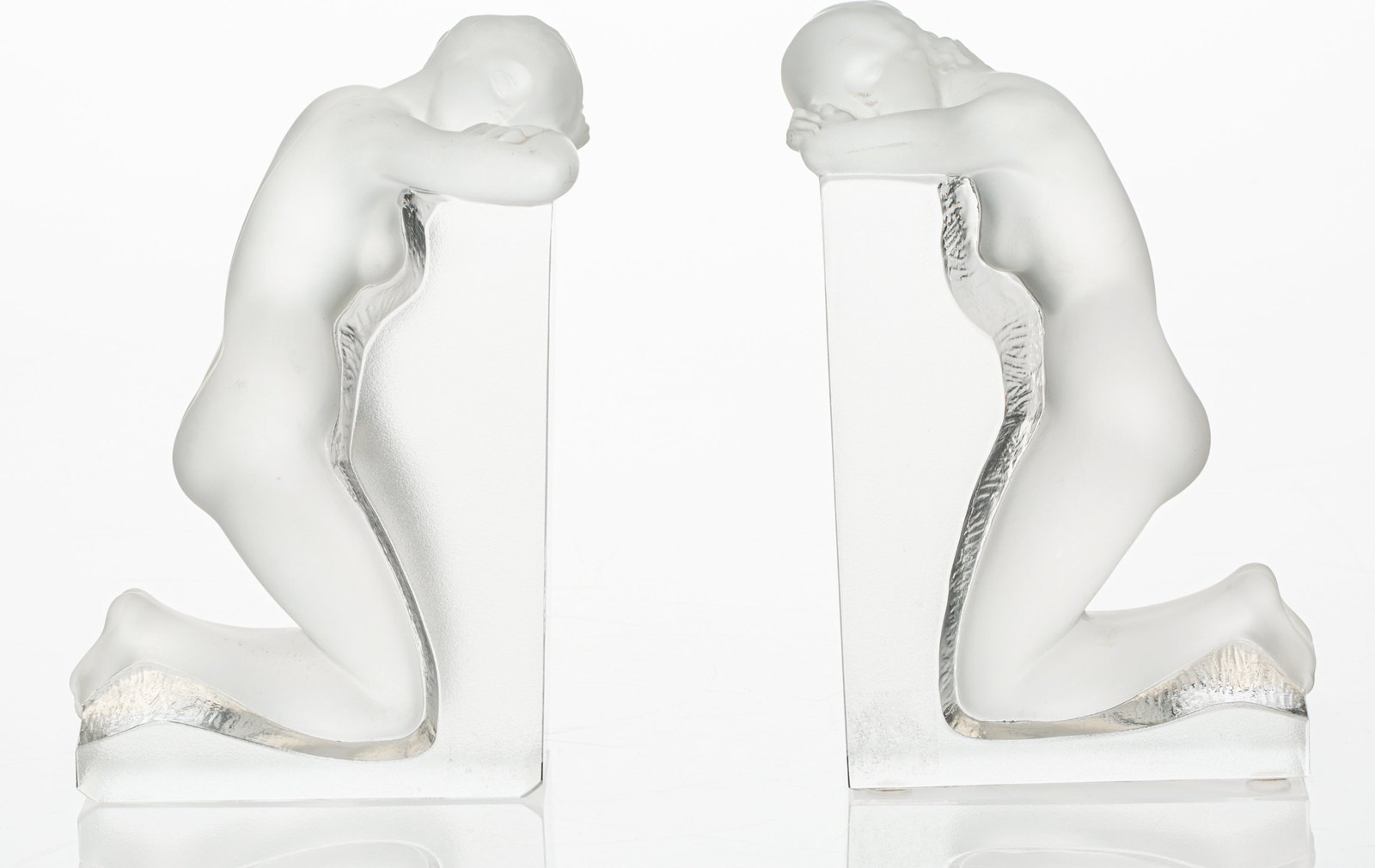 A Pair of Lalique Clear and Frosted Glass Reverie Bookends